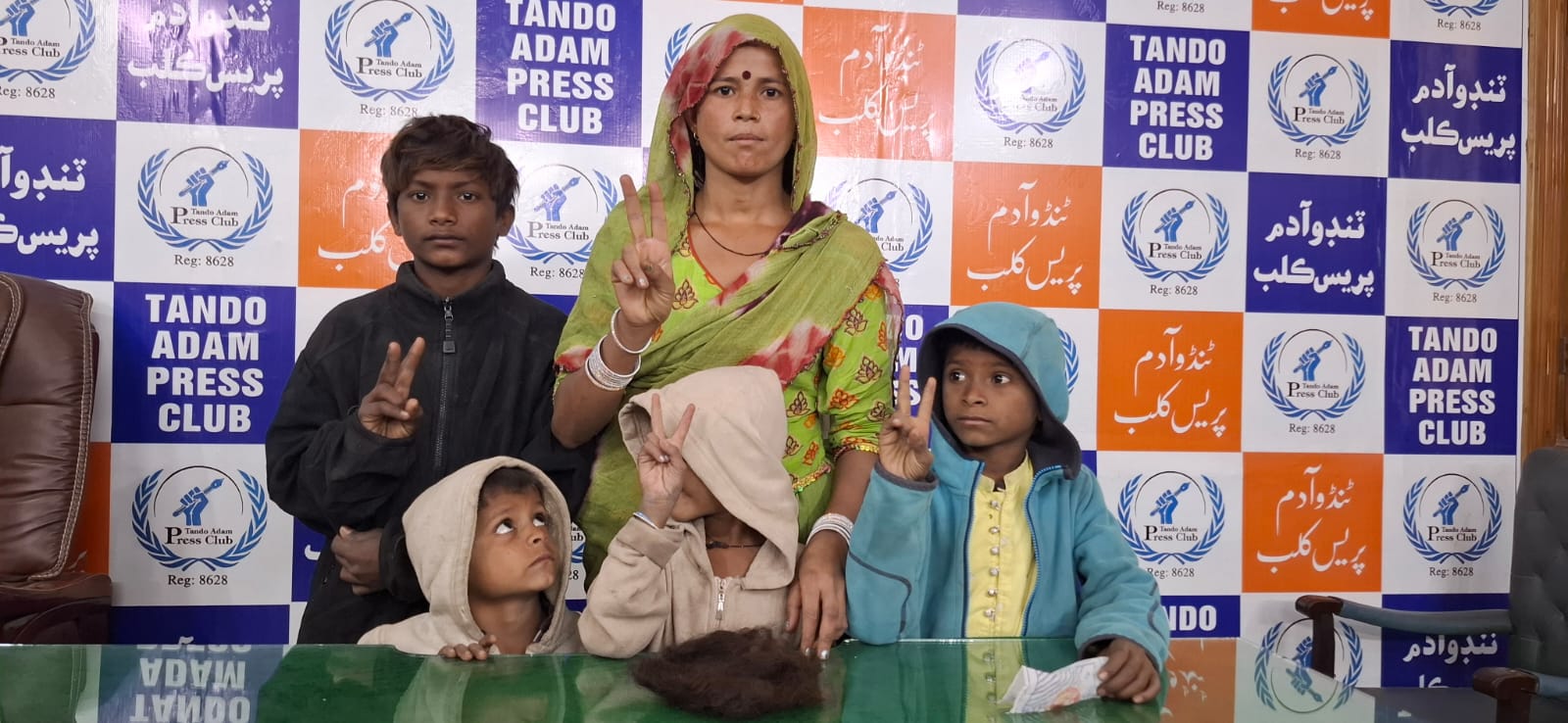 Woman from Tando Adam Protests with Her Four Children Against Injustice
